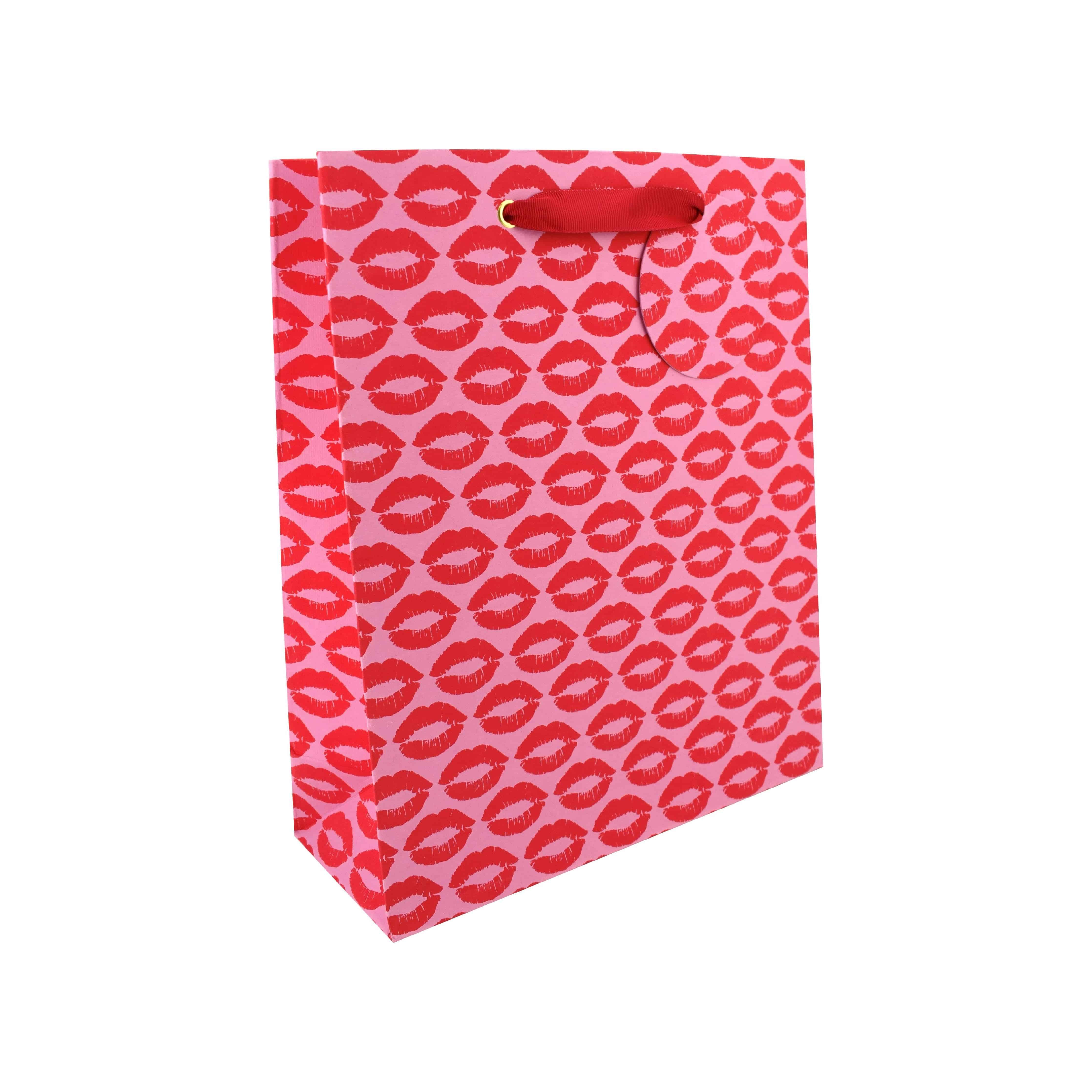 Large Love Vivid Kisses gift bag with colorful kiss print, perfect for gift wrapping and celebrations.
